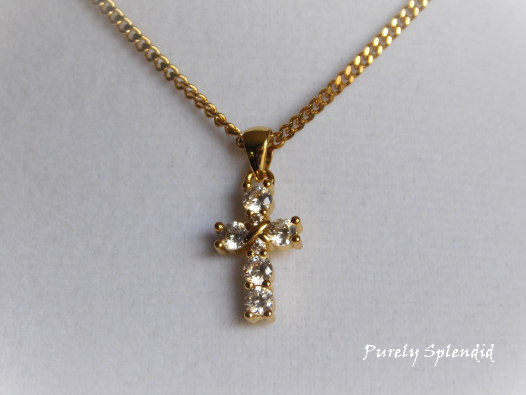 Beautiful Sparkling Gold Cross on a simple gold colored chain