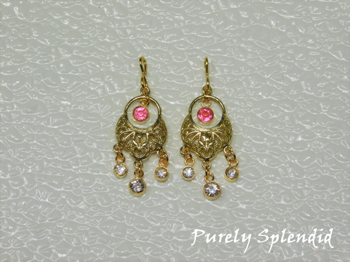 Sparkling Indian Fashion Earrings with a Dark Pink center