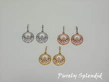 Load image into Gallery viewer, three pairs of Sparkling Indian Pearl Earrings shown on a white background. Color choices are silver, gold and rose gold. Dangles are round with an open center. They have sparkling rhinestones all around and one lone white pearl in the center
