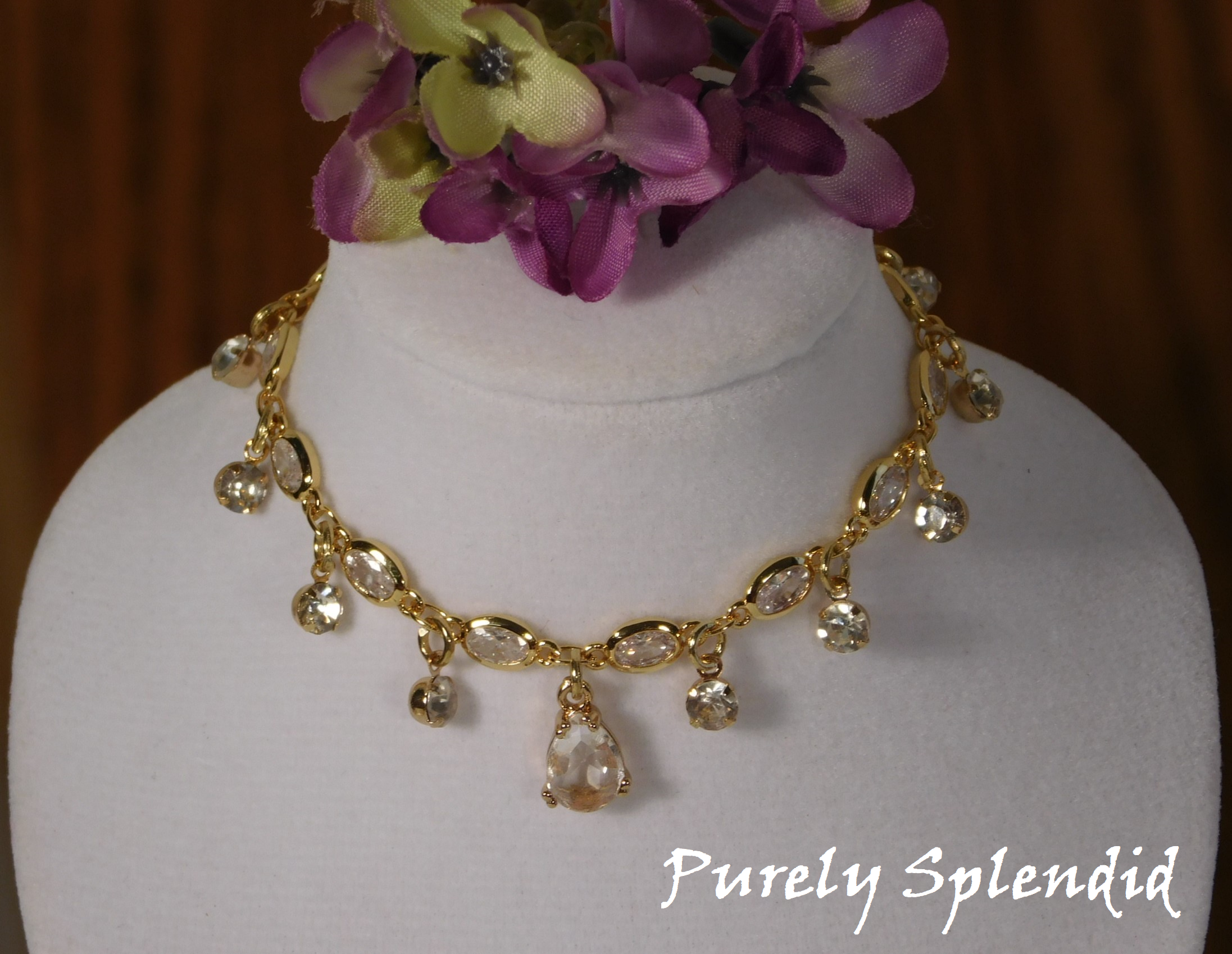 Sparkling Royalty Necklace shown on a white doll sized necklace display 