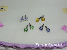 Load image into Gallery viewer, four pairs of Sparkling Soft Colors 2mm Stud Earrings, Aurora Borealis, Light Topaz, Peridot and Tanzanite for dolls
