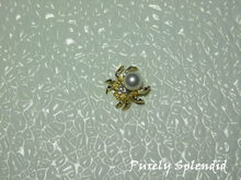 Load image into Gallery viewer, A large faux pearl is the body of this Spider Brooch
