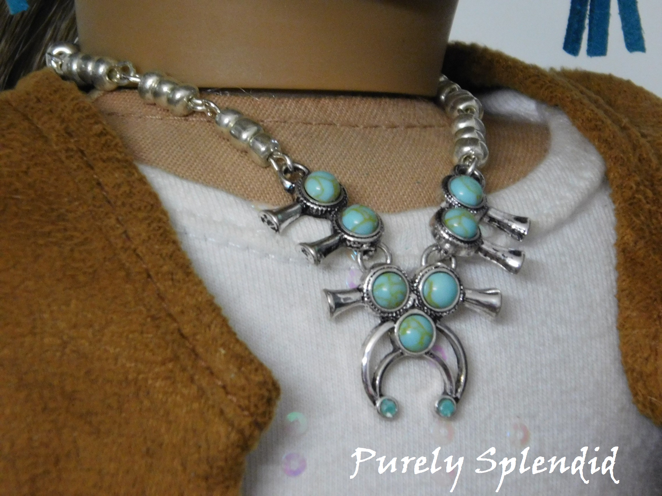 18 inch doll shown wearing Squash Blossom Necklace