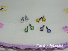 Load image into Gallery viewer, four pairs of Sparkling Soft Colors 2mm Stud Earrings, shown are Aurora Borealis, Light Topaz, Peridot and Tanzanite
