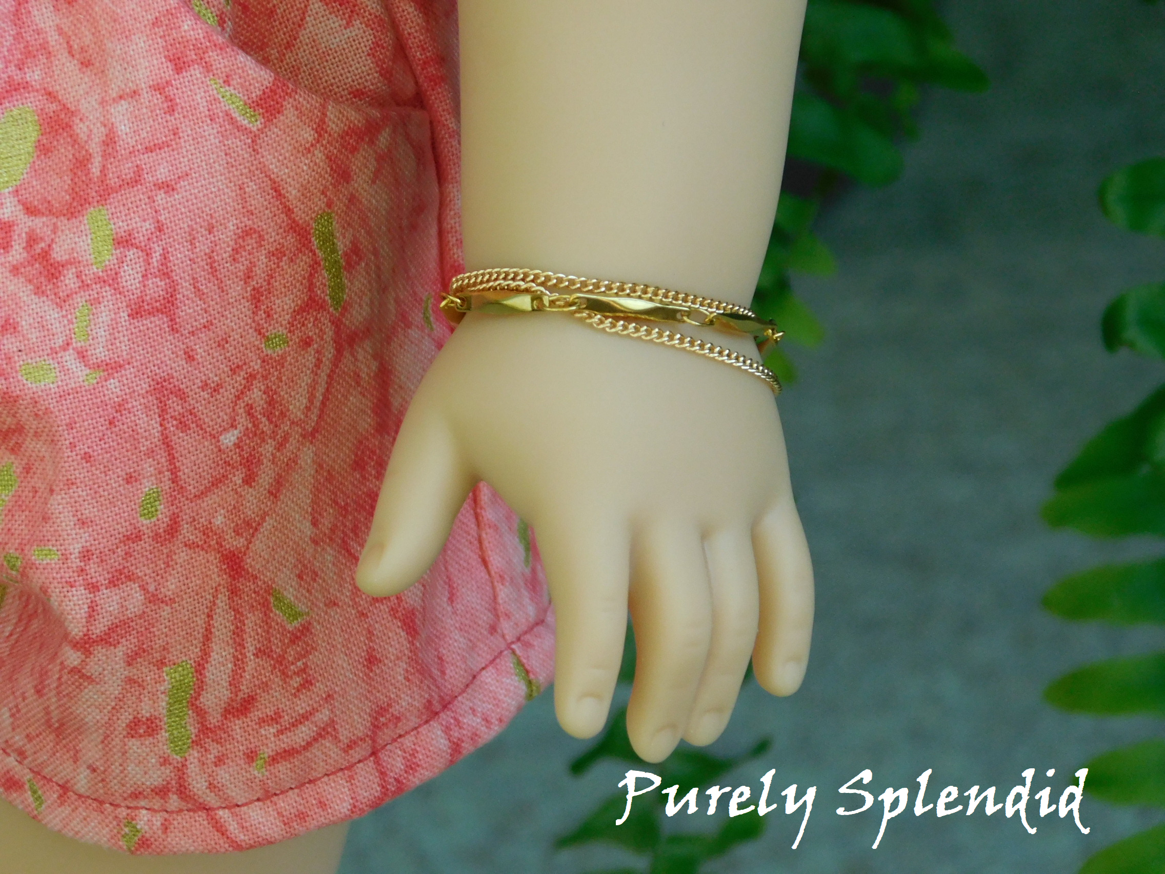 18 inch doll shown wearing a Triple Gold Chain Bracelet