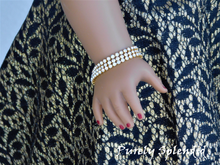 Load image into Gallery viewer, 18 inch doll with a 3 1/4&quot; wrist wearing the Triple Rhinestone Bracelet

