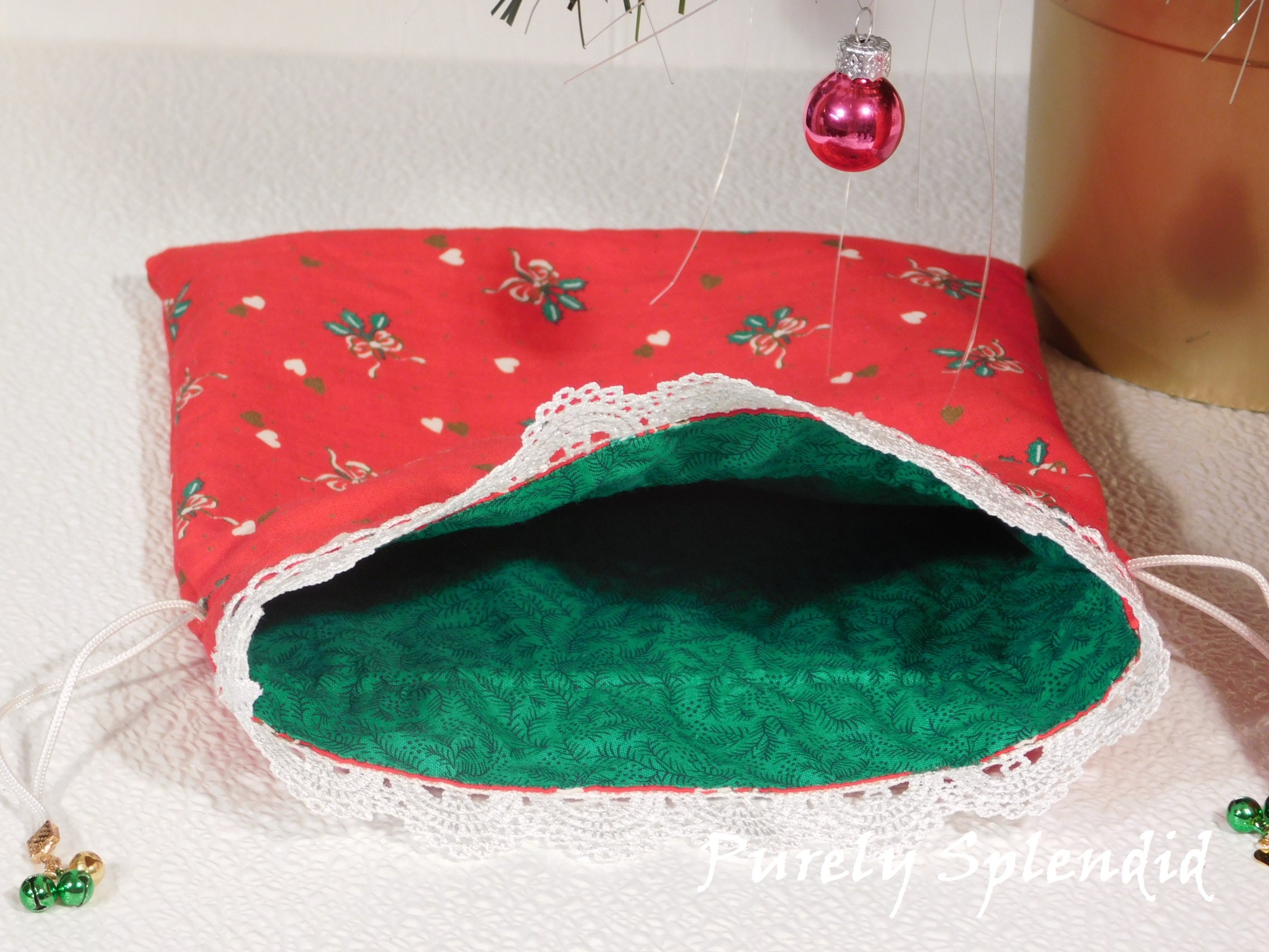 coordinating green holiday fabric lining each fabric gift bag