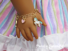 Load image into Gallery viewer, unicorn charm bracelet shown on an 18 inch doll
