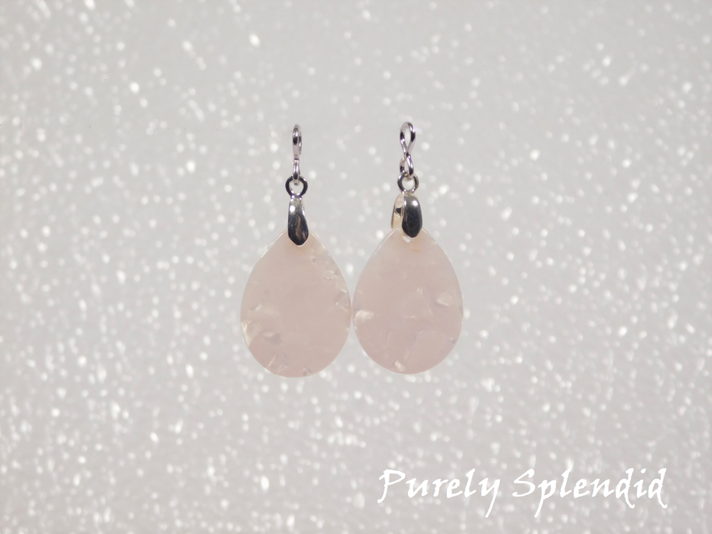White Marbled teardrop shaped Earring Dangles shown on a white background