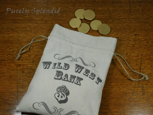 Wild West Bank bag shown laying down open with six golden wooden coins